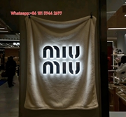 Miu Miu Glowing Logo Neutral Grey Flannel Throw Blanket Miu Miu Store Sign Printed Sofa Blanket IMG_0384